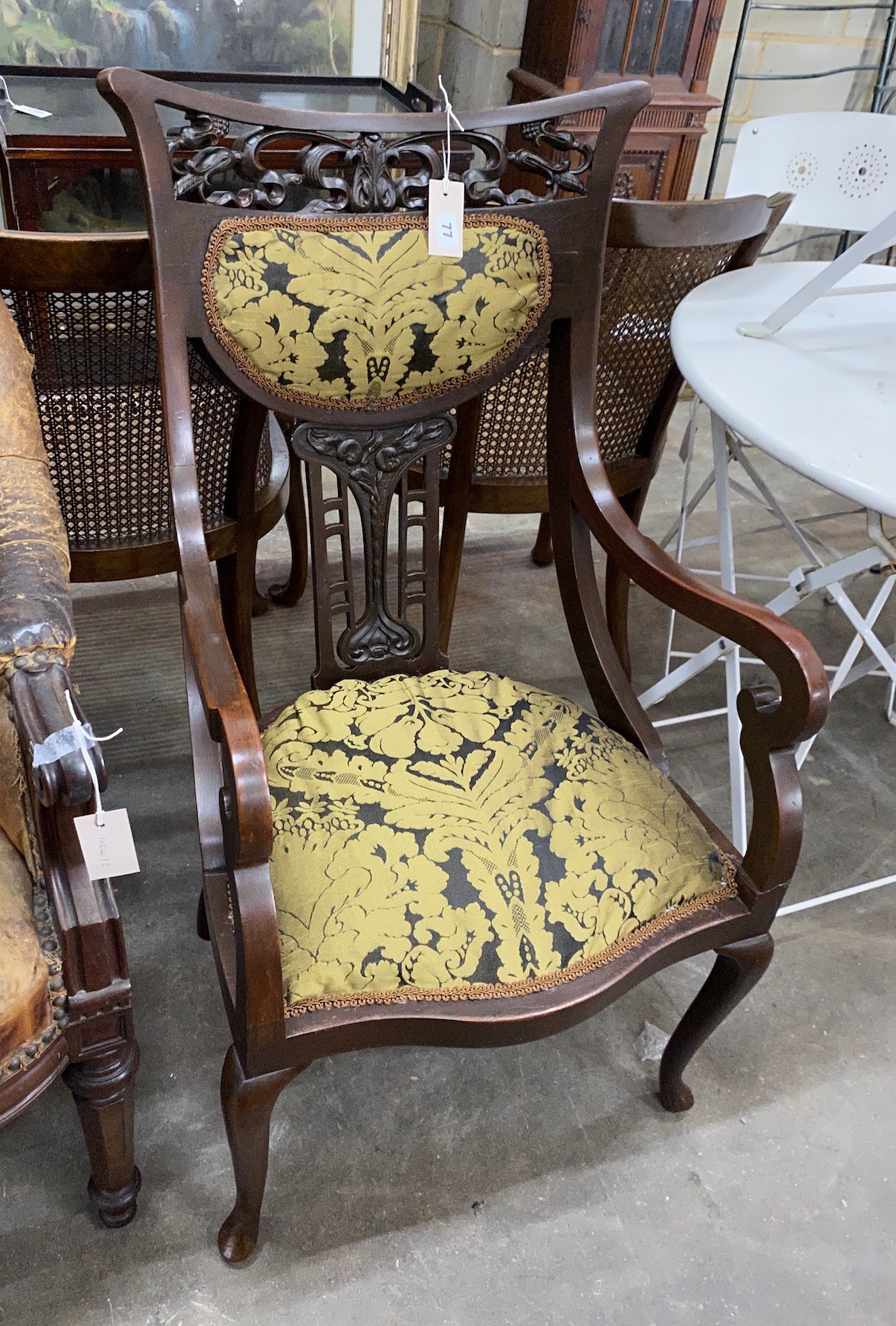 A late Victorian Art Nouveau open armchair, width 52cm, depth 44cm, height 101cm